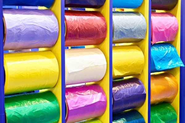 Colored plastic films in rolls at the exhibition