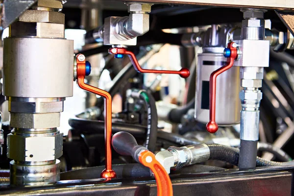 レバー及びホース産業機械付き油圧システム — ストック写真