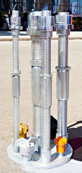 Screw anchors for drilling operations on exhibition