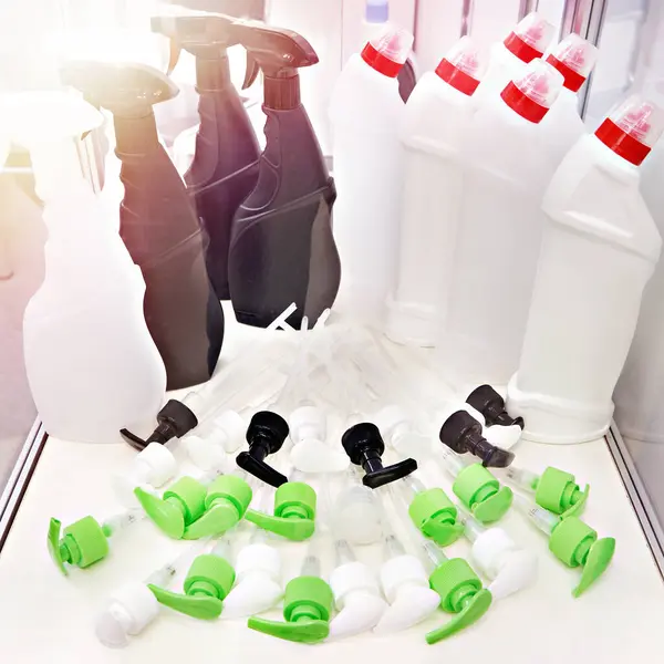 Plastic spray nozzles for household bottles in store
