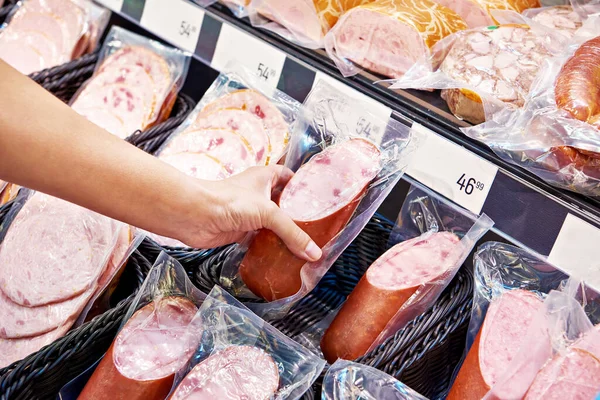 Woman Chooses Slice Sausage Ham Store — Stock Photo, Image