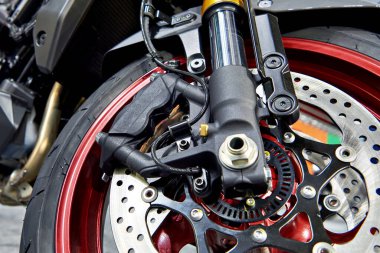 Brake disk and support of modern motorcycle clipart