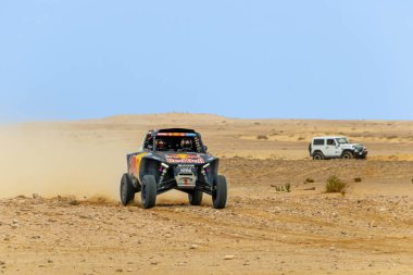 Al-Kharj, Suudi Arabistan - 10 Ocak 2023: The MCE-5 Development T3M race car of Red Bull Off-Road JR Team USA.