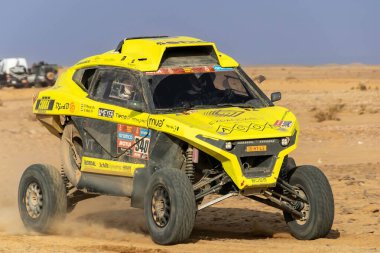 Al-Kharj, Suudi Arabistan - 10 Ocak 2023: Arcane Racing 'in Arcane T3' ü Dakar Rallisi 2023 sayısının 9. aşamasını yürütüyor..