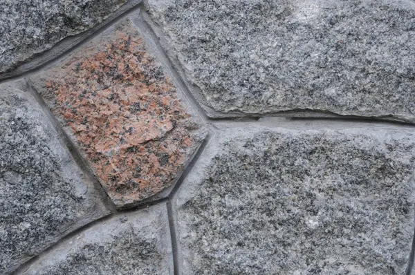 Taş duvar dokusunu kapat. Tasarım için arkaplan ve doku.