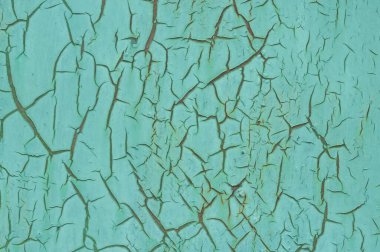 Metal bir yüzeyde eski çatlak boya. Tasarım için soyut arkaplan ve doku.