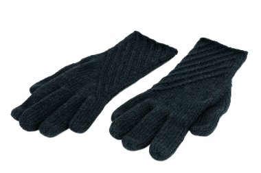 Beyaz arka planda yeşil yün eldivenler. Örülmüş yün eldivenler..