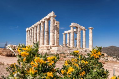 Cape Sounion with ruins of an ancient Greek temple of Poseidon in Attica, Greece