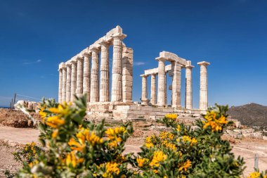 Cape Sounion with ruins of an ancient Greek temple of Poseidon in Attica, Greece clipart