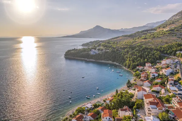 stock image Stanici village with main beach and boats on sea near the Omis in Croatia