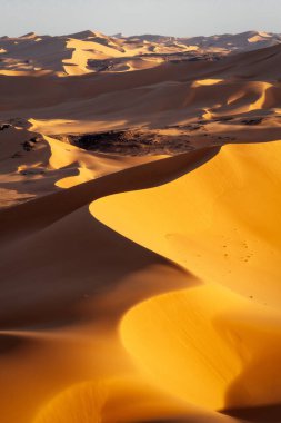 Sahara Desert Tadrart Rouge in Southern Algeria clipart