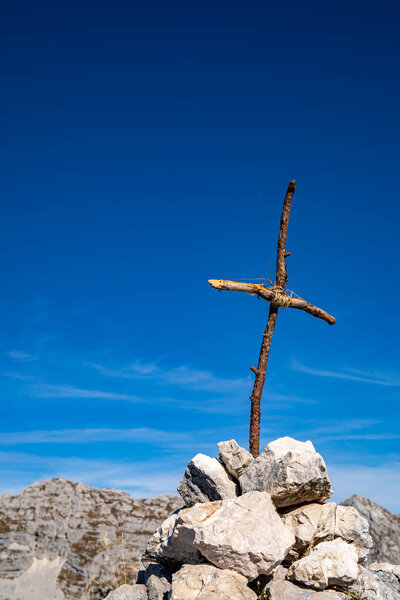 Cross up in the Alps mountains