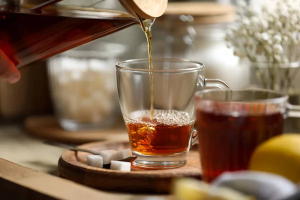 Pouring Delicious Tea Glass Cup Table Closeup — Photo