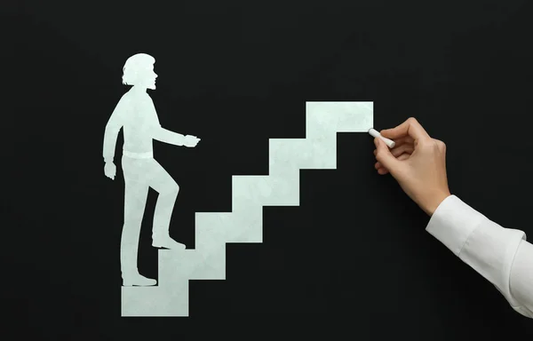 stock image Woman drawing person going up stairs on chalkboard, closeup. Steps to success