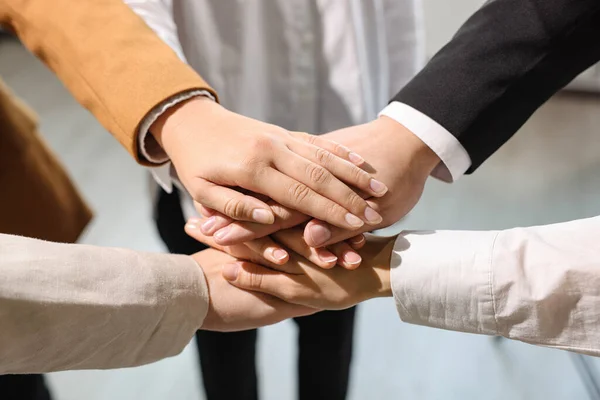 Group People Holding Hands Together Indoors Closeup Unity Concept — Fotografia de Stock