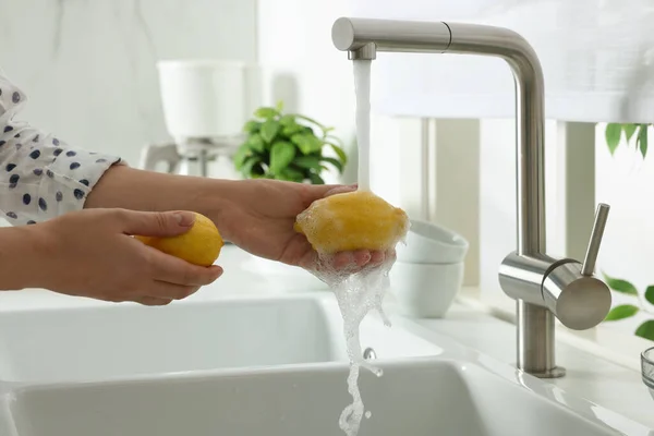 Woman Washing Fresh Ripe Lemons Tap Water Kitchen Closeup — Stok Foto