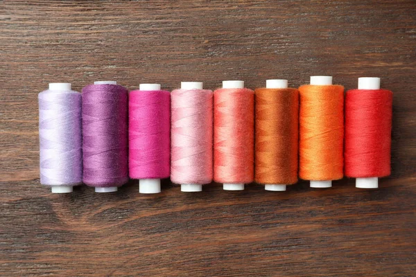 Set Colorful Sewing Threads Wooden Table Flat Lay — Stock Photo, Image
