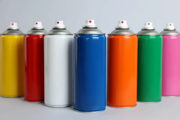 Colorful Cans Spray Paints Light Grey Background — Stock Photo, Image