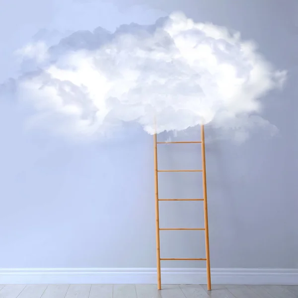Wooden ladder leading to white cloud on light blue wall in room. Concept of growth and development