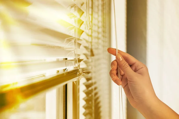 Woman Opening Horizontal Blinds Window Indoors Closeup — Foto de Stock