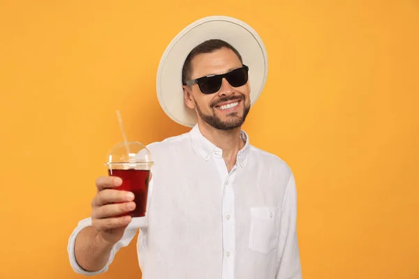 Man Holding Plastic Cup Delicious Juice Orange Background — Stock Photo, Image