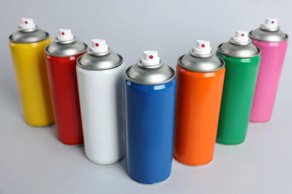 Colorful Cans Spray Paints Light Grey Background — Stock Photo, Image