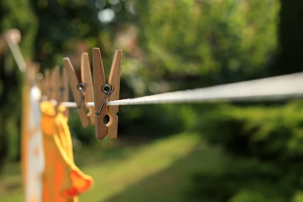 Clean Clothes Drying Outdoors Sunny Day Focus Laundry Line Wooden — Photo