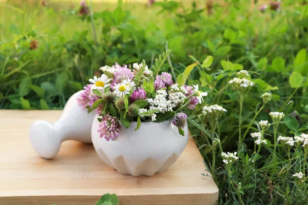 Ceramic Mortar Pestle Different Wildflowers Herbs Wooden Board Meadow — Photo