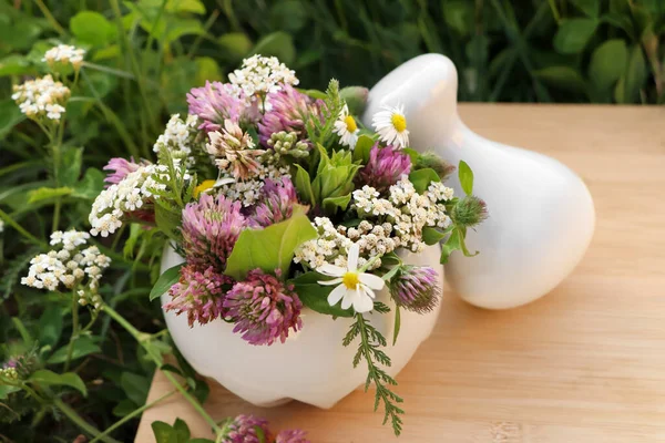 Ceramic Mortar Pestle Different Wildflowers Herbs Green Grass Outdoors Closeup — Stock Photo, Image