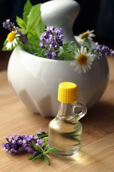 Bottle Natural Lavender Essential Oil Mortar Flowers Wooden Table — ストック写真