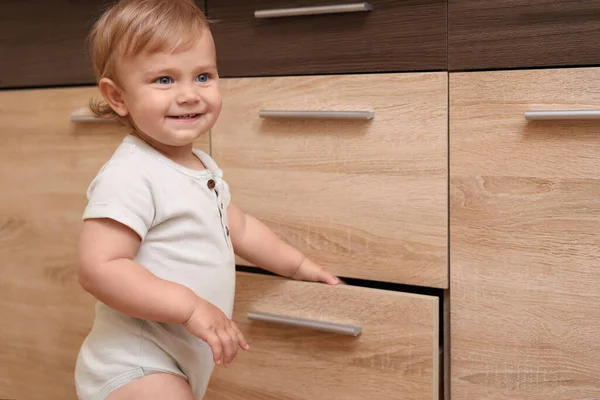 Little Child Exploring Drawer Indoors Dangerous Situation — Foto de Stock