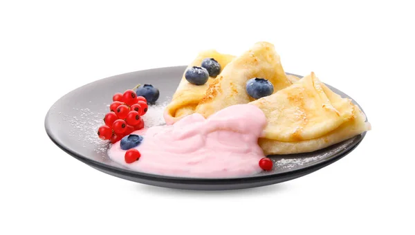 stock image Delicious crepes with natural yogurt, blueberries and red currants on white background