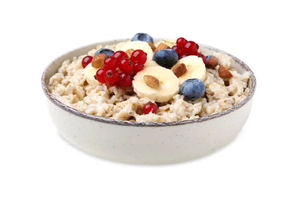 stock image Ceramic bowl with oatmeal, berries and banana slices isolated on white