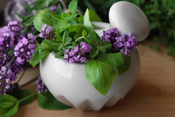 Mortar Fresh Lavender Flowers Herbs Pestle Wooden Table Closeup — Zdjęcie stockowe