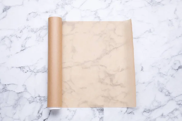Roll Baking Paper White Marble Table Top View — Stock Photo, Image