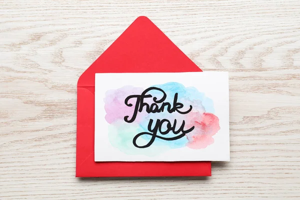 Envelope Card Phrase Thank You Light Wood Table Top View — стокове фото