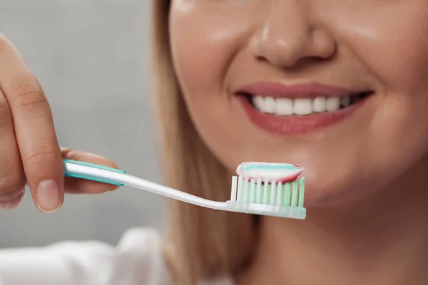 Woman Holding Brush Toothpaste Bathroom Closeup — Stock Photo, Image
