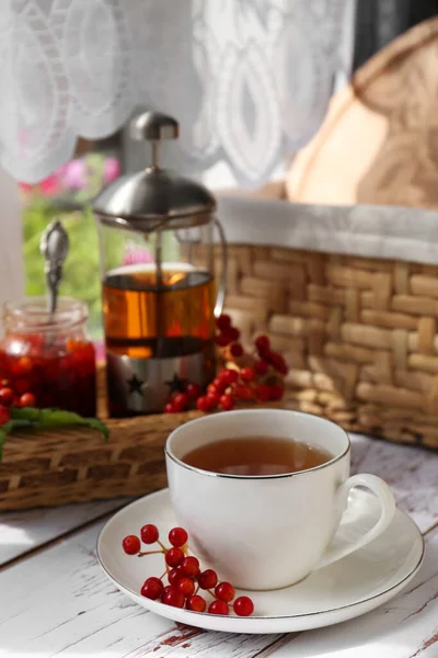 Cup Hot Drink Viburnum Berries White Wooden Table Indoors — Stock Photo, Image