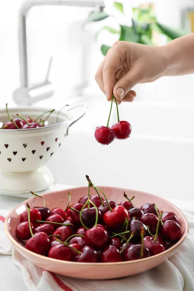 Woman Holding Fresh Ripe Cherries Bowl Kitchen Closeup — Stock Photo, Image