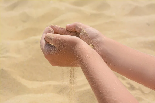 Child Pouring Sand Hands Beach Closeup Fleeting Time Concept — ストック写真