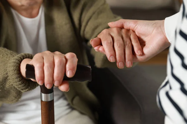 Caregiver Elderly Woman Walking Cane Home Closeup — Fotografia de Stock