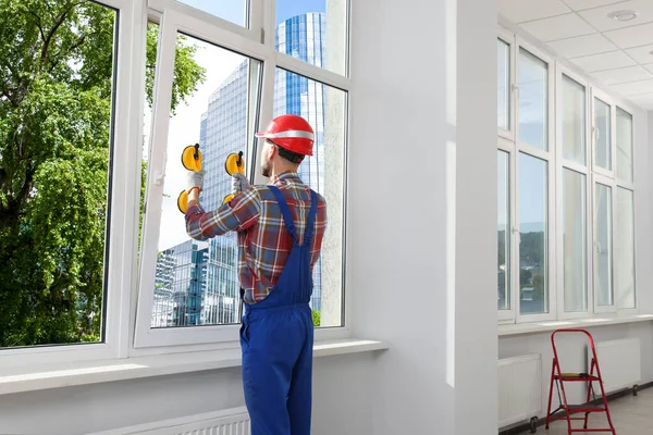 Worker Using Suction Lifters Plastic Window Installation Indoors — Stok fotoğraf