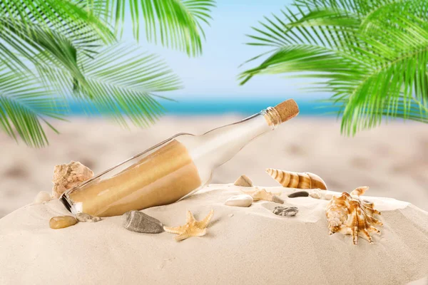 Corked Glass Bottle Rolled Paper Note Seashells Sandy Beach Palms — Stock Photo, Image