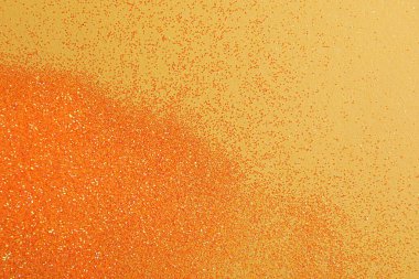 Bej arka planda parlak parlak parıltı, düz yatış. Metin için boşluk