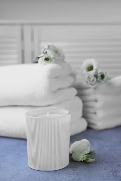 Scented Candle Folded Towels Eustoma Flowers Gray Marble Table — Stockfoto