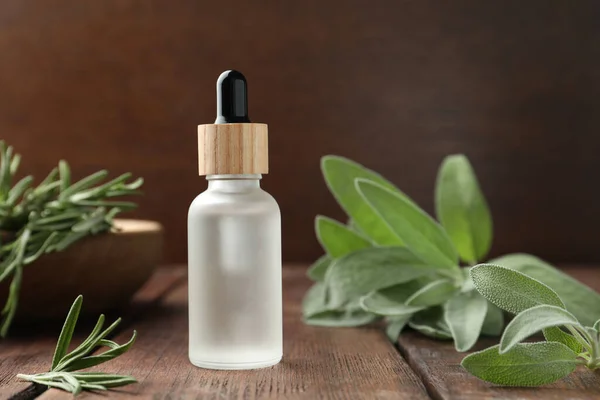 Bottle Essential Oil Fresh Herbs Wooden Table Space Text — Stockfoto