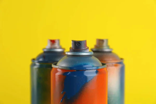 Used Cans Spray Paints Yellow Background Closeup — Stock Photo, Image