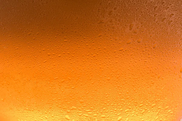 Glass Tasty Cold Beer Condensation Drops Background Closeup — Zdjęcie stockowe