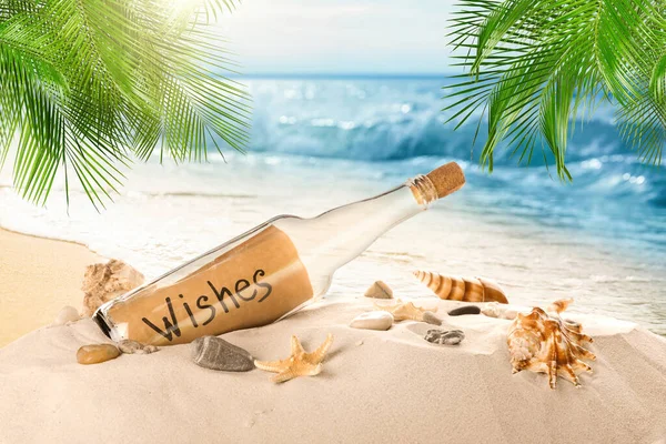Corked Glass Bottle Rolled Paper Note Seashells Sandy Beach Palms — Stock Photo, Image
