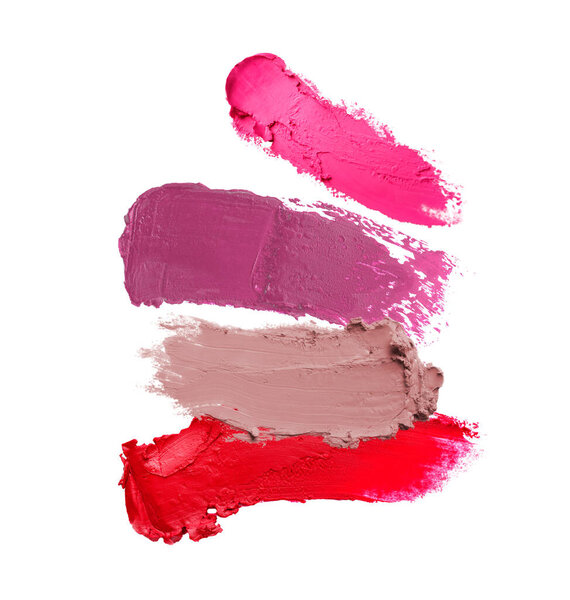 Различные мазки помады на белом фоне. Косметический продукт